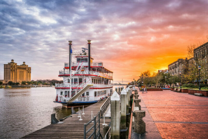 A riverboat docked on the river in Savannah