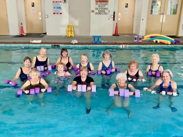 residents exercising in the pool