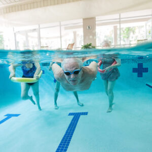 Elderly people doing pool therapy 